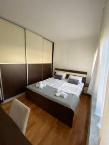 Postel nebo postele na pokoji v ubytování Apartman Nika
