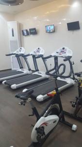 a gym with two tread machines and a treadmill at 2 minutes from Sheraton Oran. Come and relax here. in Oran
