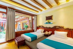 Frida's Inn 丽江梦之旅观景客栈客房内的一张或多张床位
