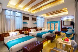 Frida's Inn 丽江梦之旅观景客栈客房内的一张或多张床位