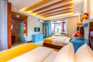 Frida's Inn 丽江梦之旅观景客栈客房内的一张或多张床位