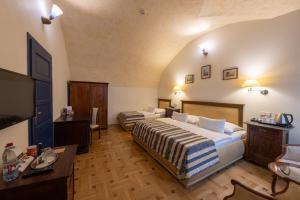 Posteľ alebo postele v izbe v ubytovaní Hotel Elite Prague