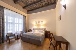 Posteľ alebo postele v izbe v ubytovaní Hotel Elite Prague