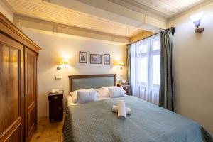 Posteľ alebo postele v izbe v ubytovaní Hotel Elite Prague