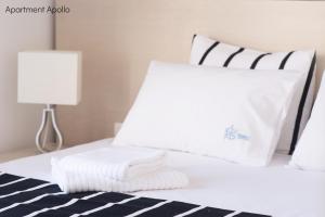 Katil atau katil-katil dalam bilik di Apollo & Artemis by Heloni Apartments