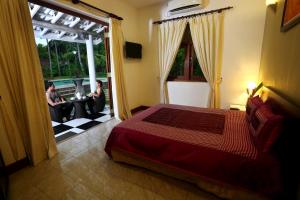 Postel nebo postele na pokoji v ubytování Villa Velmarie Yoga and Ayurveda house all inclusive