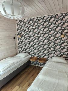 Postel nebo postele na pokoji v ubytování Morska Szyszka & Leśne SPA