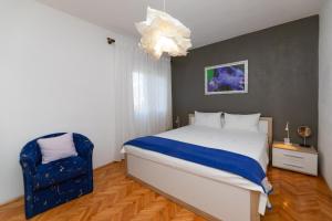 Postel nebo postele na pokoji v ubytování Apartments Martic
