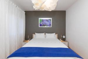 Postel nebo postele na pokoji v ubytování Apartments Martic