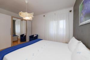מיטה או מיטות בחדר ב-Apartments Martic