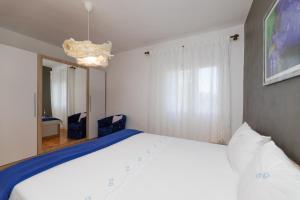 Postel nebo postele na pokoji v ubytování Apartments Martic
