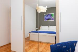 Postel nebo postele na pokoji v ubytování Apartments Martic