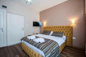 Postel nebo postele na pokoji v ubytování Newway Apartments