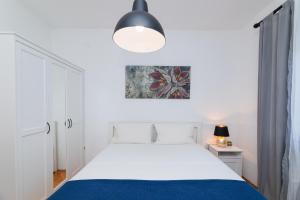 Postel nebo postele na pokoji v ubytování Apartments Martic