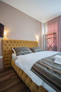 Postel nebo postele na pokoji v ubytování Newway Apartments