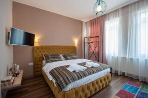 Postel nebo postele na pokoji v ubytování Newway Apartments