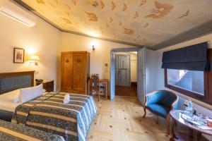 Posteľ alebo postele v izbe v ubytovaní Hotel Elite Prague