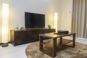 Телевизор и/или развлекательный центр в Audrey Chalet +1 фотография