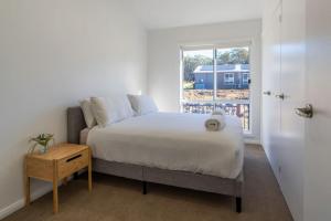 Ένα ή περισσότερα κρεβάτια σε δωμάτιο στο Beadnell By The Bay