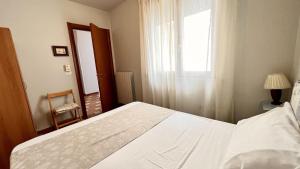 Posteľ alebo postele v izbe v ubytovaní Casa Vacanza Vista Mare Salento