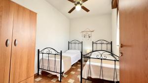 Posteľ alebo postele v izbe v ubytovaní Casa Vacanza Vista Mare Salento