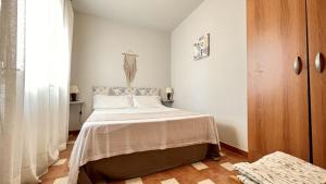 Posteľ alebo postele v izbe v ubytovaní Casa Vacanza Vista Mare Salento