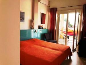 En eller flere senge i et værelse på Appartement BlueLAGON + 11 billeder