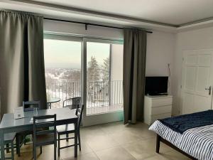 Posteľ alebo postele v izbe v ubytovaní Old Hill Residence Csopak