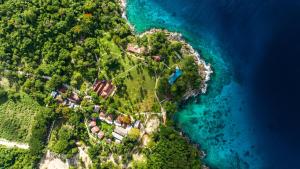 an aerial view of an island in the ocean at Ban Raya Resort and Spa in Ko Racha Yai 