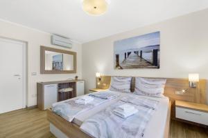 Posteľ alebo postele v izbe v ubytovaní Apartment Stanko