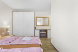 Posteľ alebo postele v izbe v ubytovaní Apartment Stanko