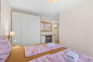 Posteľ alebo postele v izbe v ubytovaní Apartment Stanko