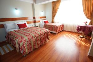 Katil atau katil-katil dalam bilik di Hostal Los Andes