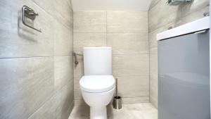 Kúpeľňa v ubytovaní Apartamenty Sun & Snow Rumiankowa