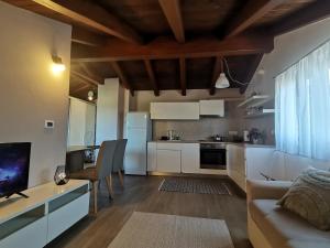 Kuchyň nebo kuchyňský kout v ubytování Apartment Harmony + 17 fotografií