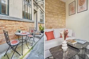 Apartment Center of Paris by Studio prestige في باريس: غرفة معيشة مع أريكة وطاولة