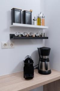 A kitchen or kitchenette at Lyto by Heloni Apartments