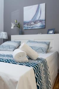 A bed or beds in a room at Lyto by Heloni Apartments