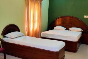 Ένα ή περισσότερα κρεβάτια σε δωμάτιο στο Hotel Paul