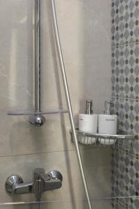 a bathroom with two toilets on a shelf at Modern, Cosy 1BD Apartment - Close to Valletta in Hamrun