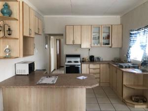 Köök või kööginurk majutusasutuses The Corner (Self Catering Accommodation, Windhoek)