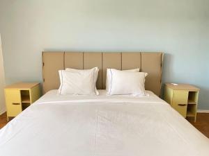 En eller flere senge i et værelse på Setubal Sunset