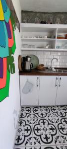 a kitchen with a sink and a counter top at Stone Cottage garden, terrace sea and forest view in Marmaris