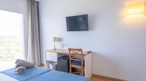 Postel nebo postele na pokoji v ubytování Seth Playa Azul