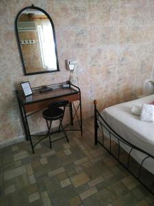 A bed or beds in a room at Lucas B Panorama