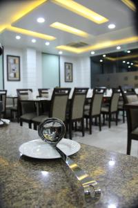 Χώρος καθιστικού στο Hotel The Marque Mathura