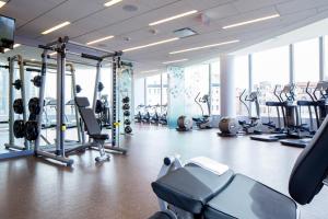a gym with a lot of treadmills and machines at Downtown 2br w gym wd nr Chinatown BOS-878 in Boston