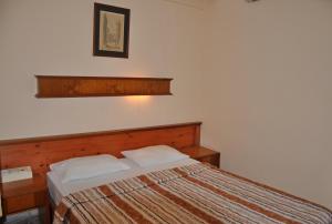 Postel nebo postele na pokoji v ubytování Tuncer Garden Hotel