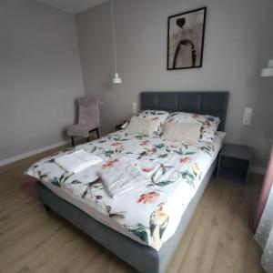Posteľ alebo postele v izbe v ubytovaní Apartament PERŁA POŁUDNIA