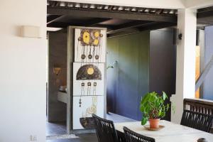 a door to a patio with a table and chairs at Lot 33 Boutique Hotel in Pantai Cenang +109 photos
